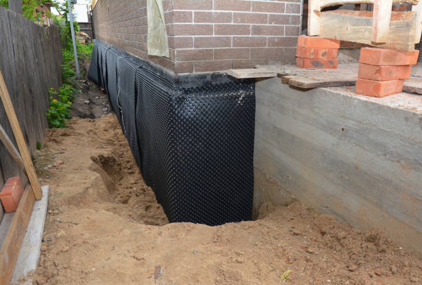 Happy homeowners after waterproofing job in Verbena